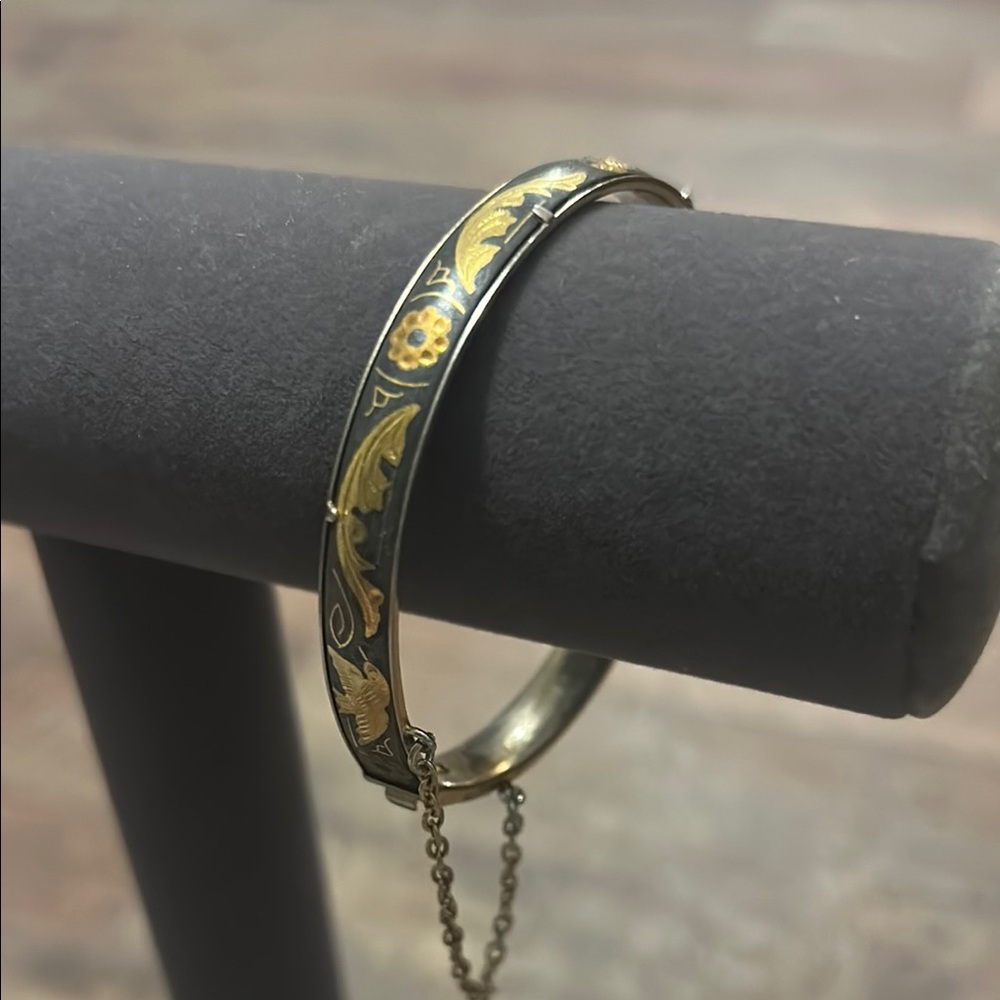 Elegant Gold and Black Bangle Bracelet